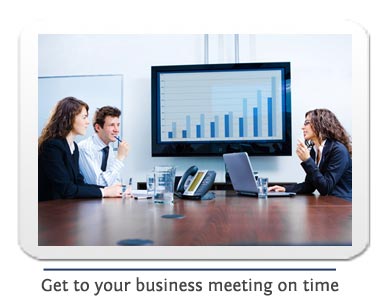 2 women and a man in a business meeting
